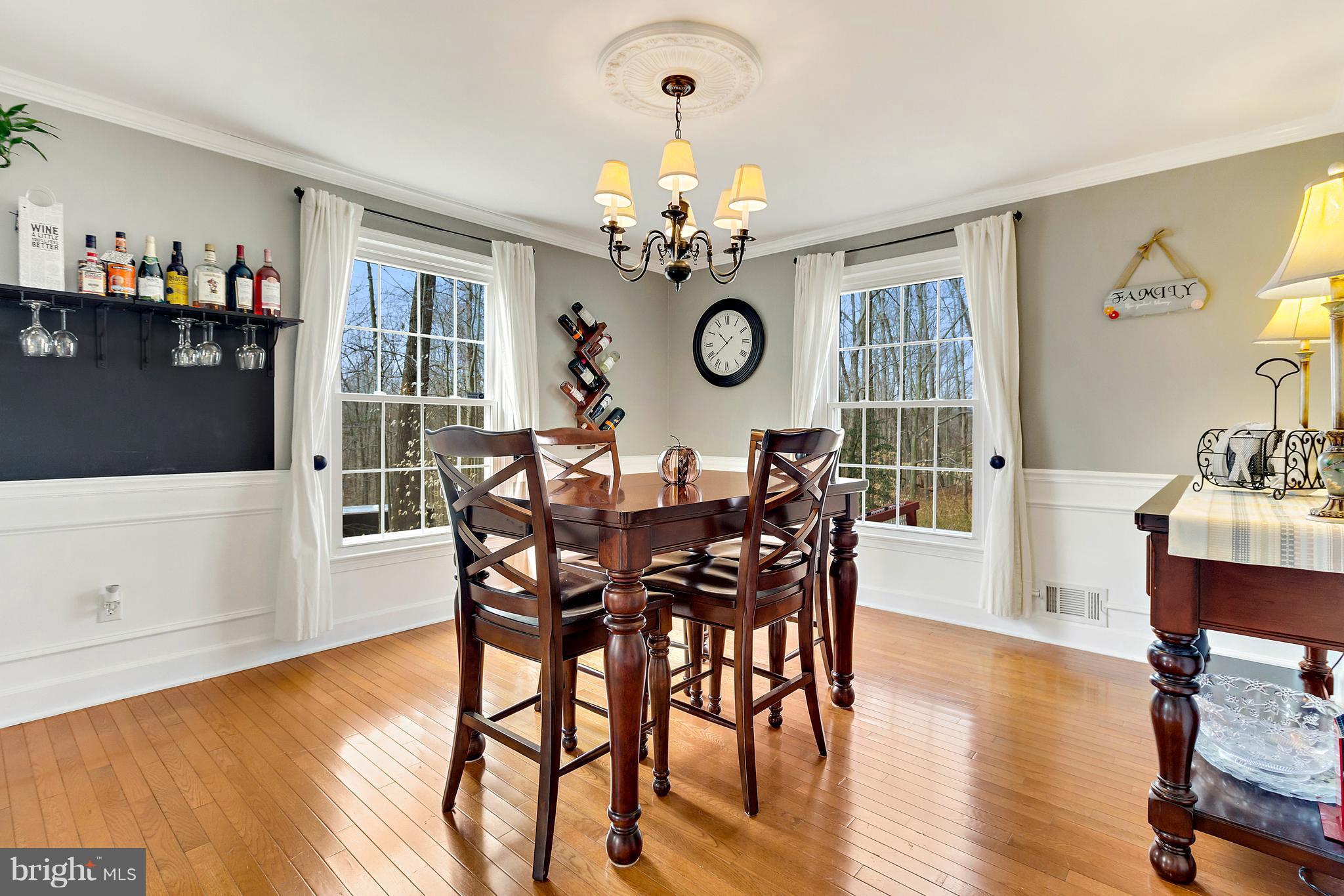 8040 Stillbrooke Road Manassas, VA 20112 - Photo 4 of 29 Wood Floors, Wainscoting, Crown Moulding