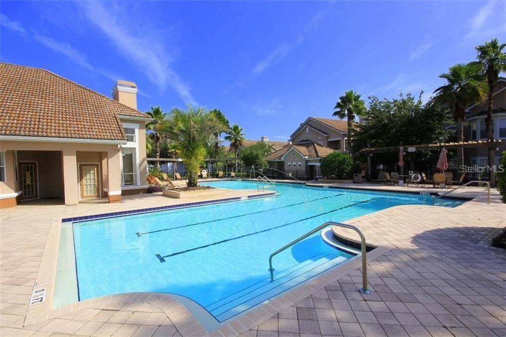 18108 Villa Creek Drive Tampa, FL 33647 - Photo 14 of 25 a view of a patio with swimming pool