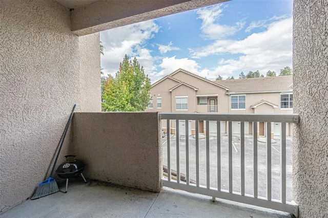 a view of a balcony with an outdoor space