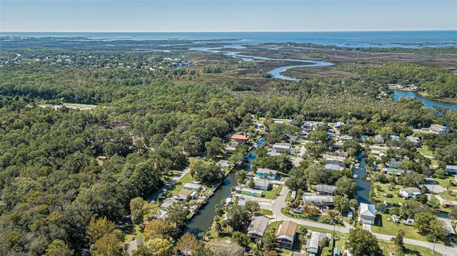 an aerial view of residential building and green space