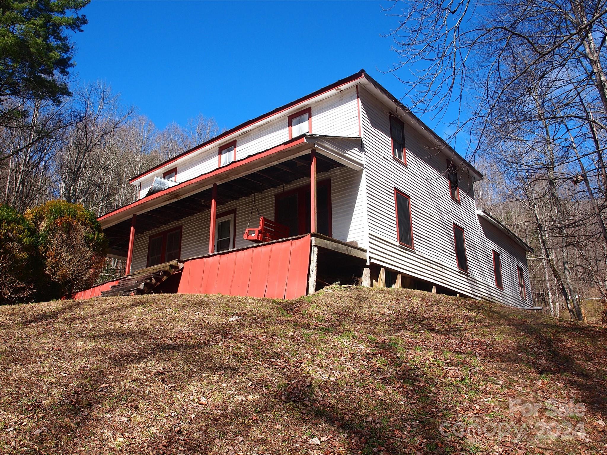 664 Woodfin Road Sylva, NC 28779 - Photo 20 of 34 a front view of house with yard