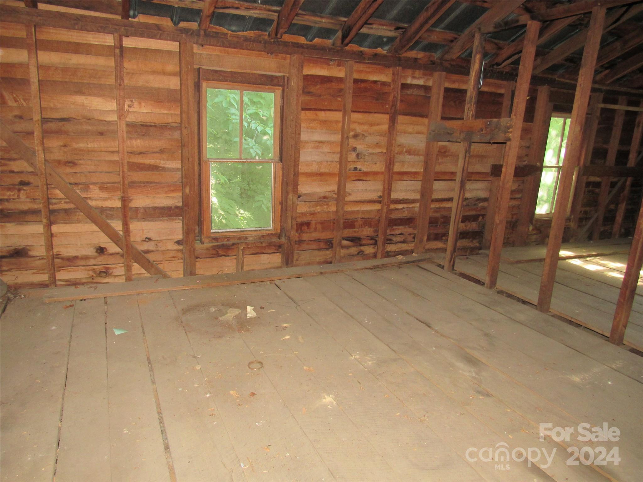 664 Woodfin Road Sylva, NC 28779 - Photo 25 of 34 a view of empty room with window