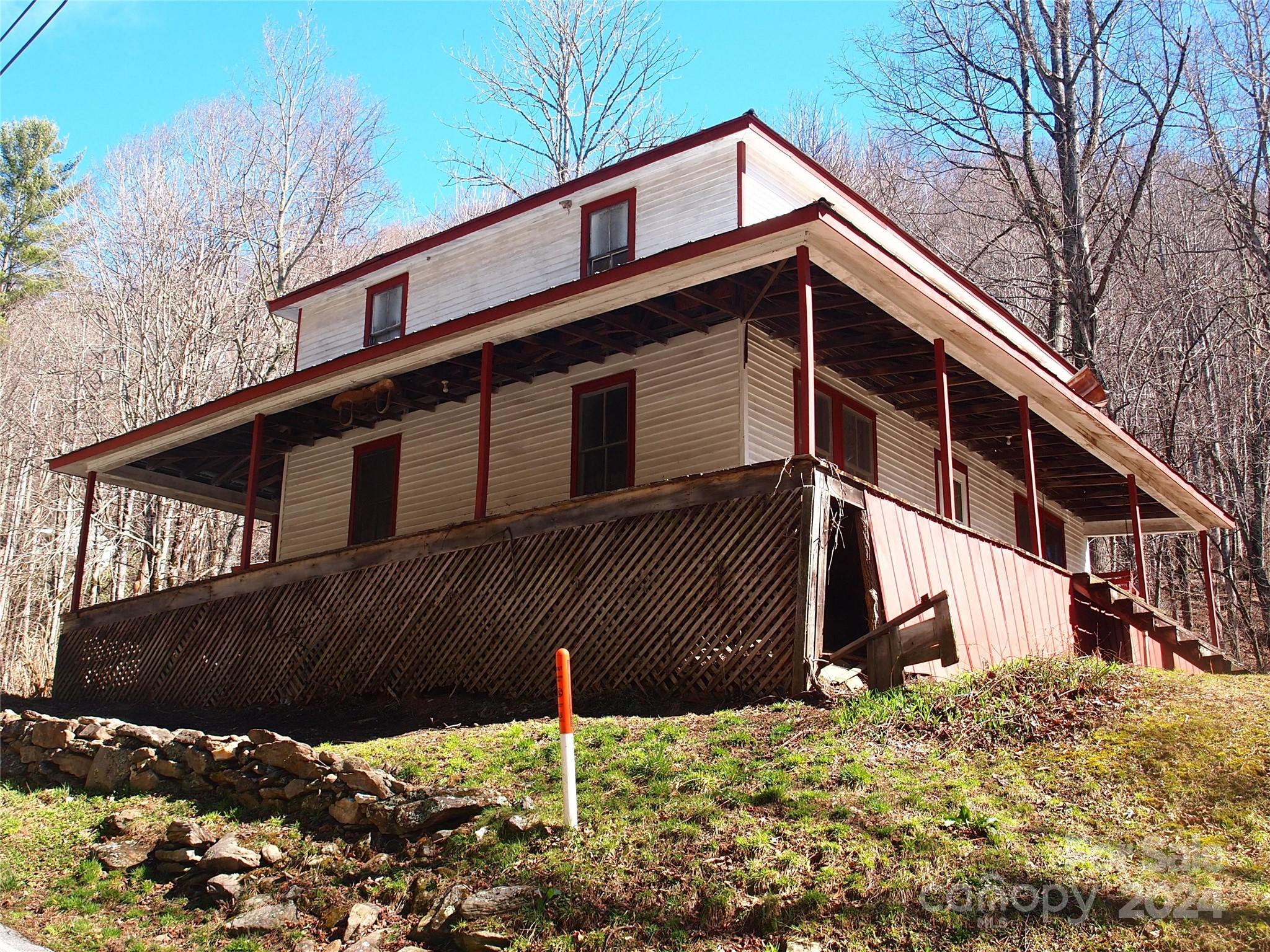 664 Woodfin Road Sylva, NC 28779 - Photo 34 of 34 a front view of a house with a yard