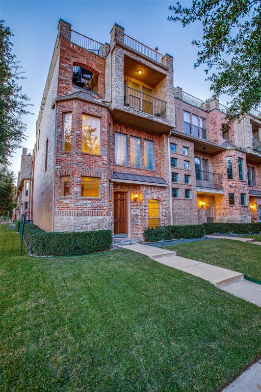 4105 Lafayette Street Dallas, TX 75204 - Photo 1 of 1 a view of a brick building next to a big yard