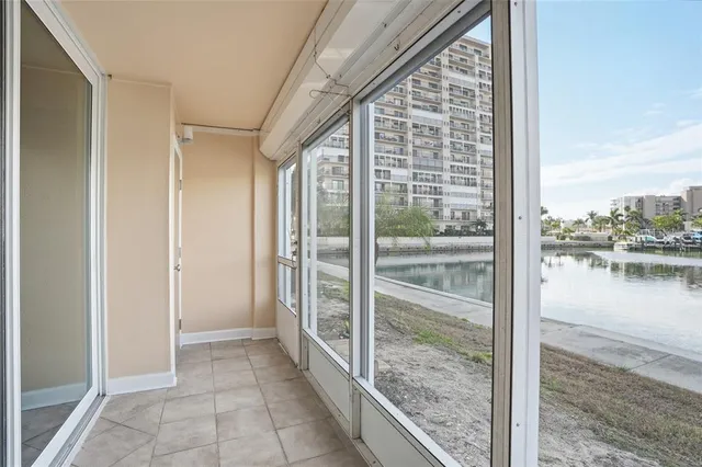 a view of balcony with wooden floor