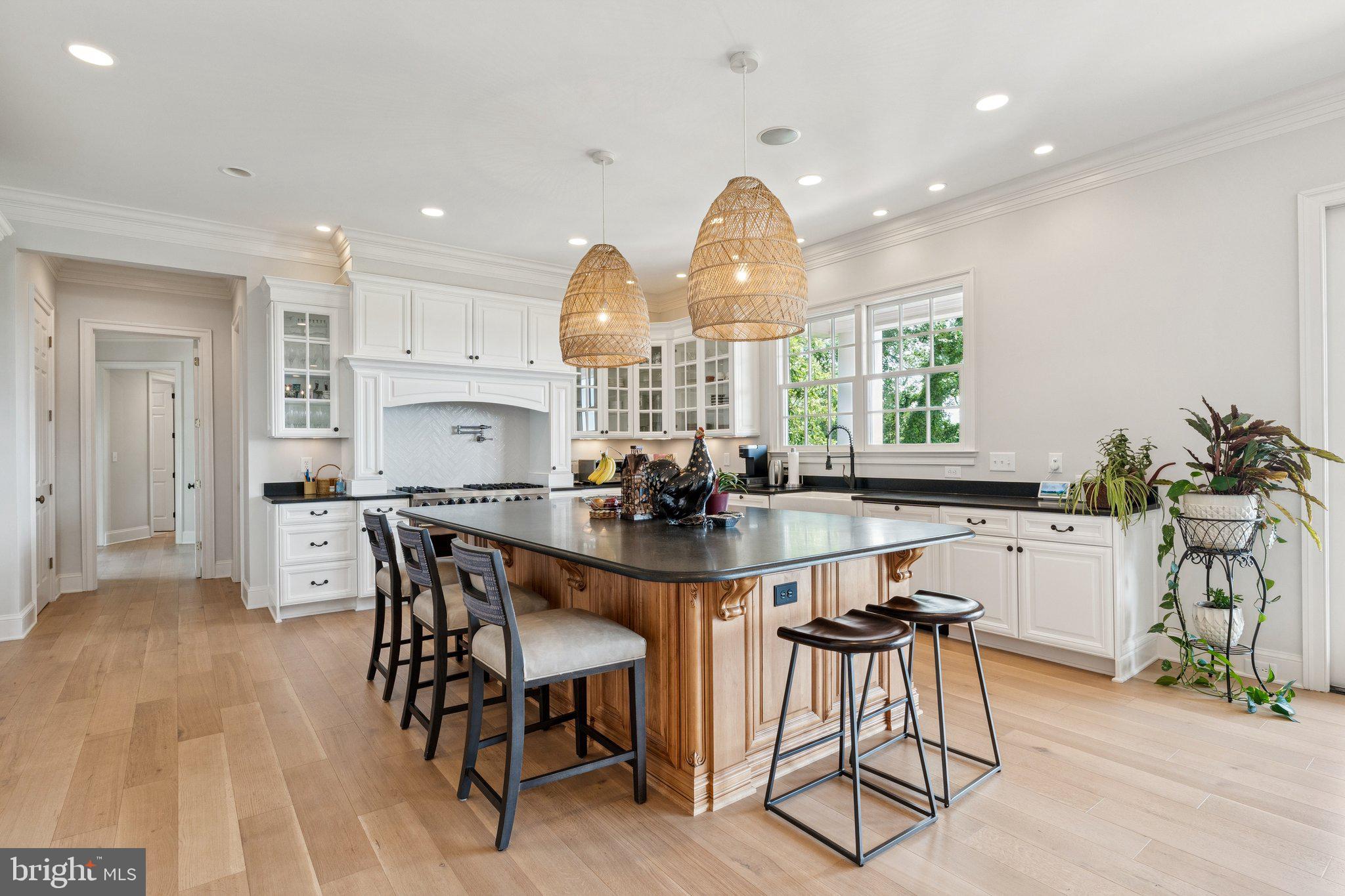 1932 Carrollton Road Annapolis, MD 21409 - Photo 13 of 85 a view of a dining room with furniture window and wooden floor