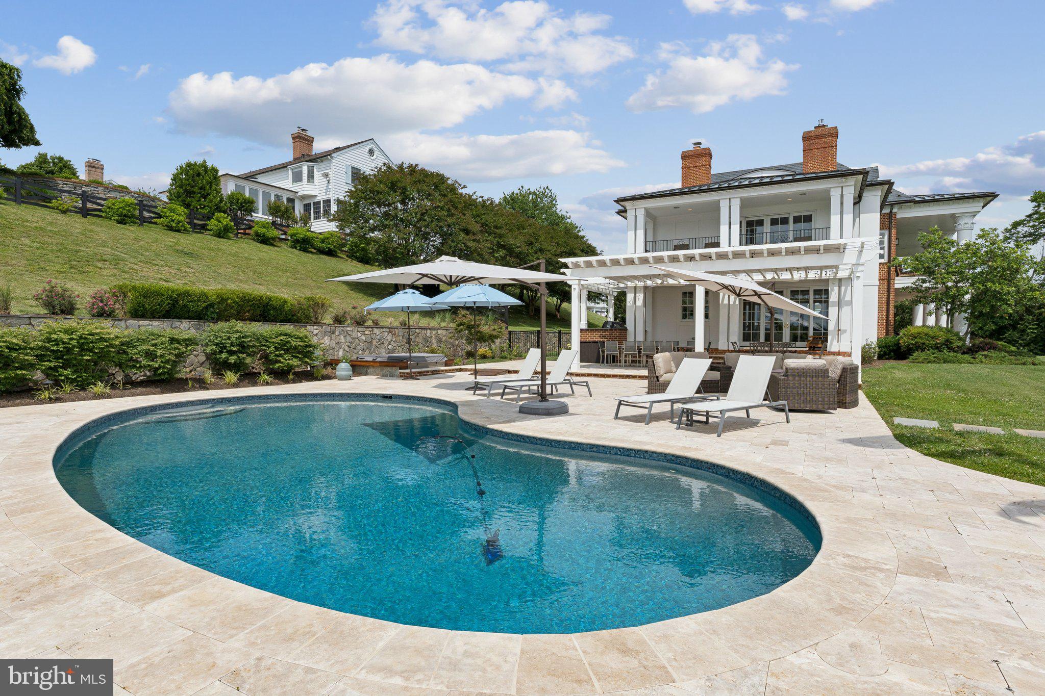 1932 Carrollton Road Annapolis, MD 21409 - Photo 24 of 85 a view of a swimming pool with a patio
