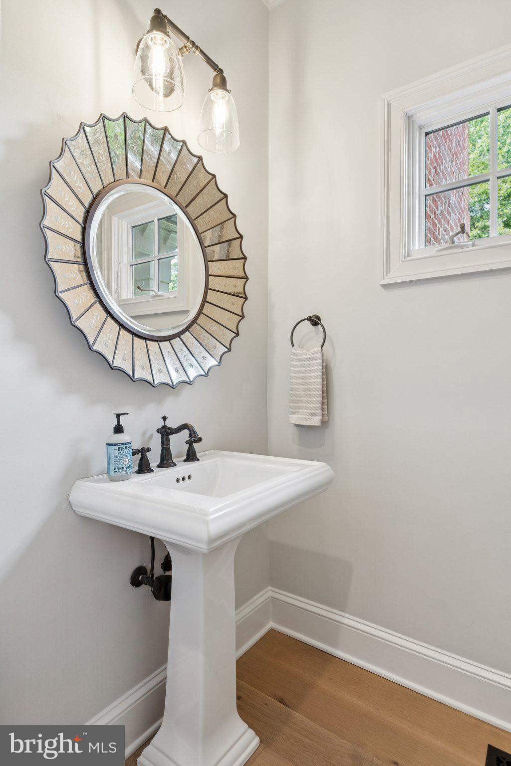 1932 Carrollton Road Annapolis, MD 21409 - Photo 58 of 85 a bathroom with a sink and a mirror