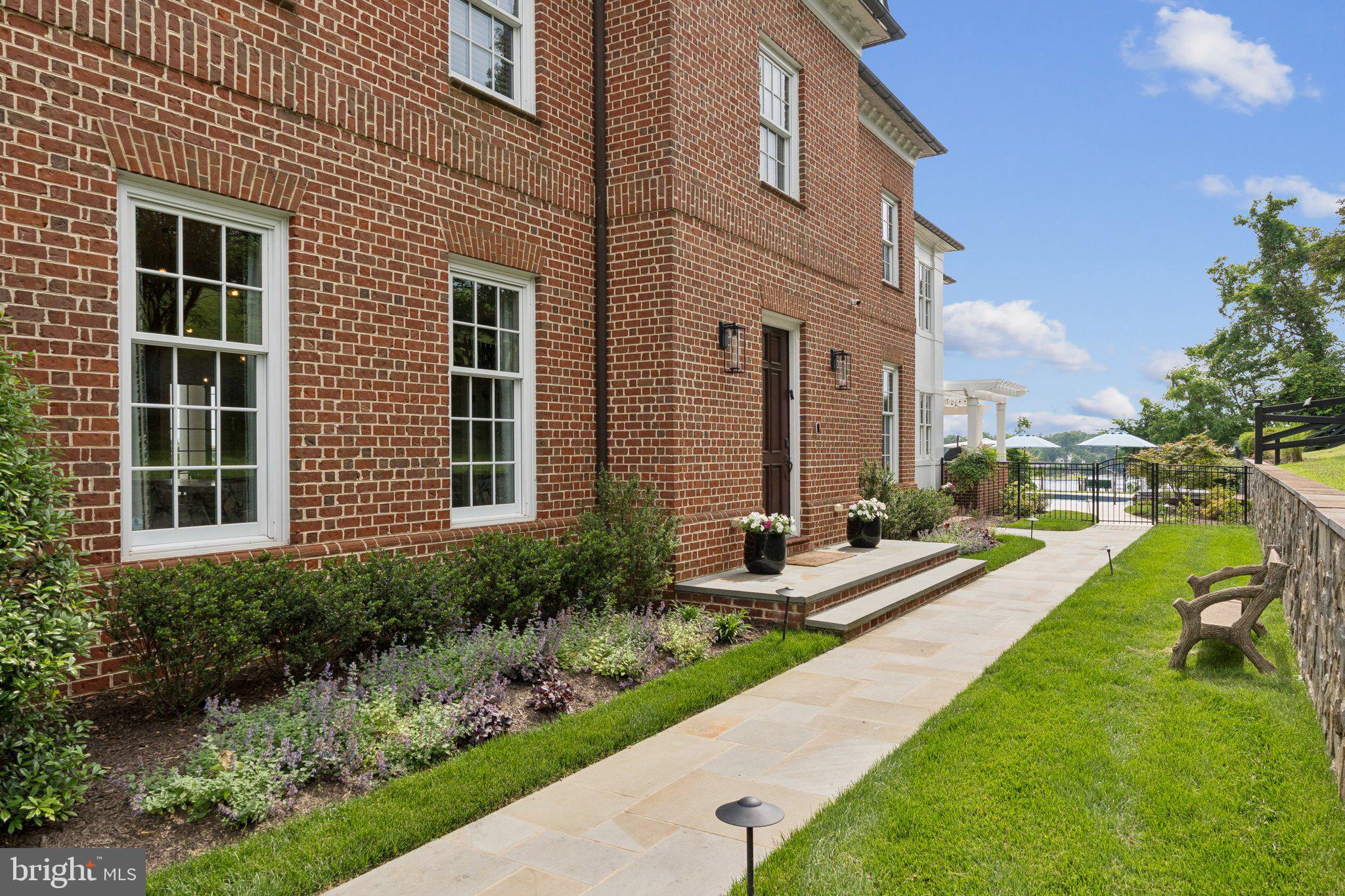 1932 Carrollton Road Annapolis, MD 21409 - Photo 72 of 85 a view of a house with backyard sitting area and garden