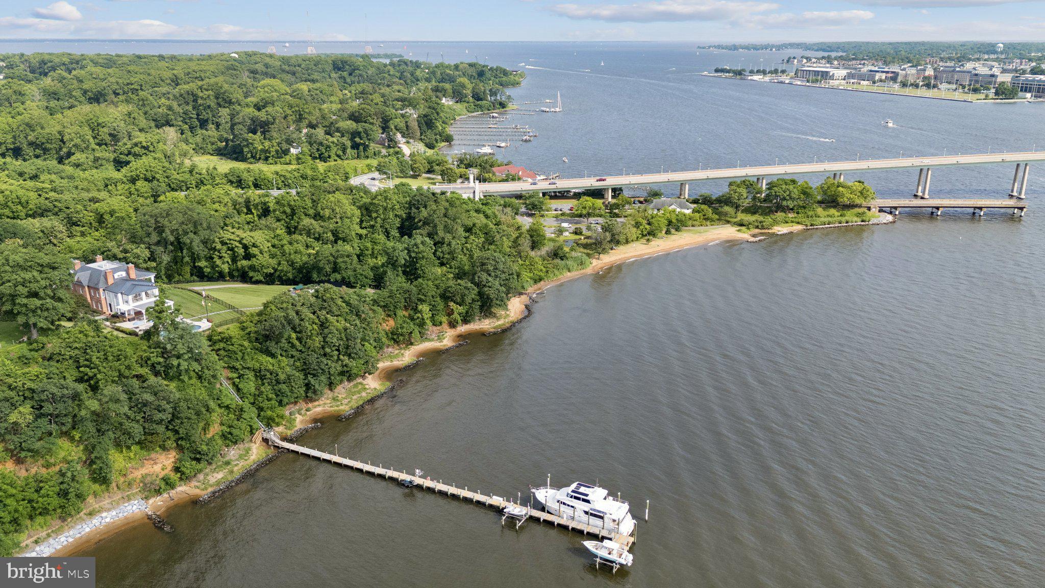 1932 Carrollton Road Annapolis, MD 21409 - Photo 82 of 85 an aerial view of a house with a yard and lake view