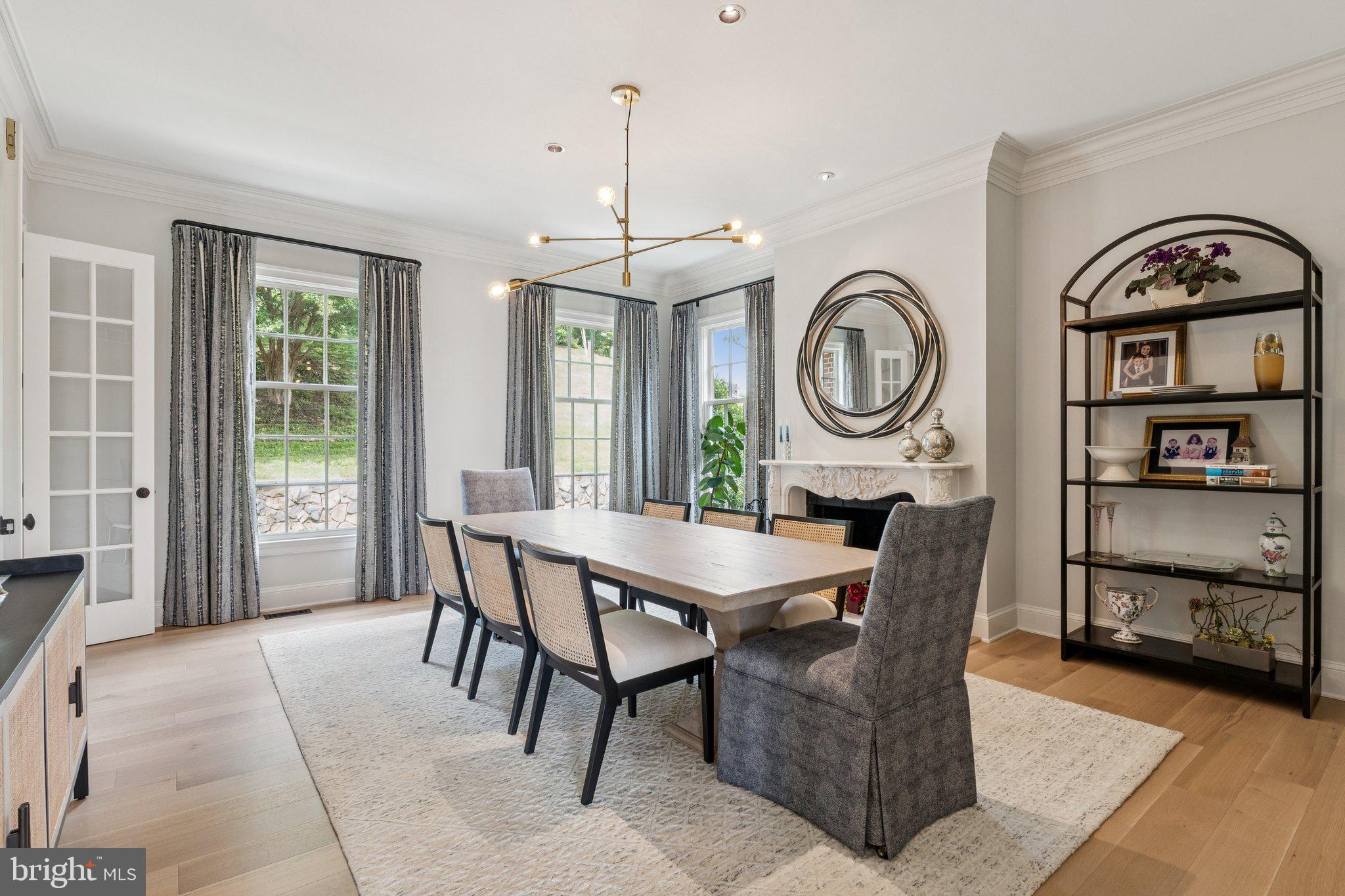 1932 Carrollton Road Annapolis, MD 21409 - Photo 10 of 85 a view of a dining room with furniture window and wooden floor