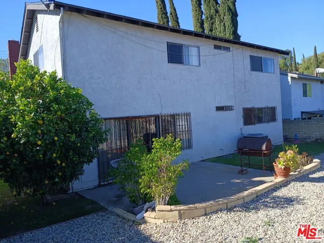a view of a backyard with plants