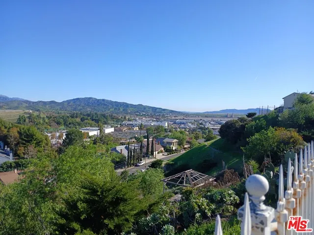 a view of a city from a balcony