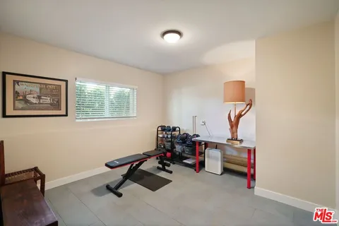 a room with furniture and a wooden floor