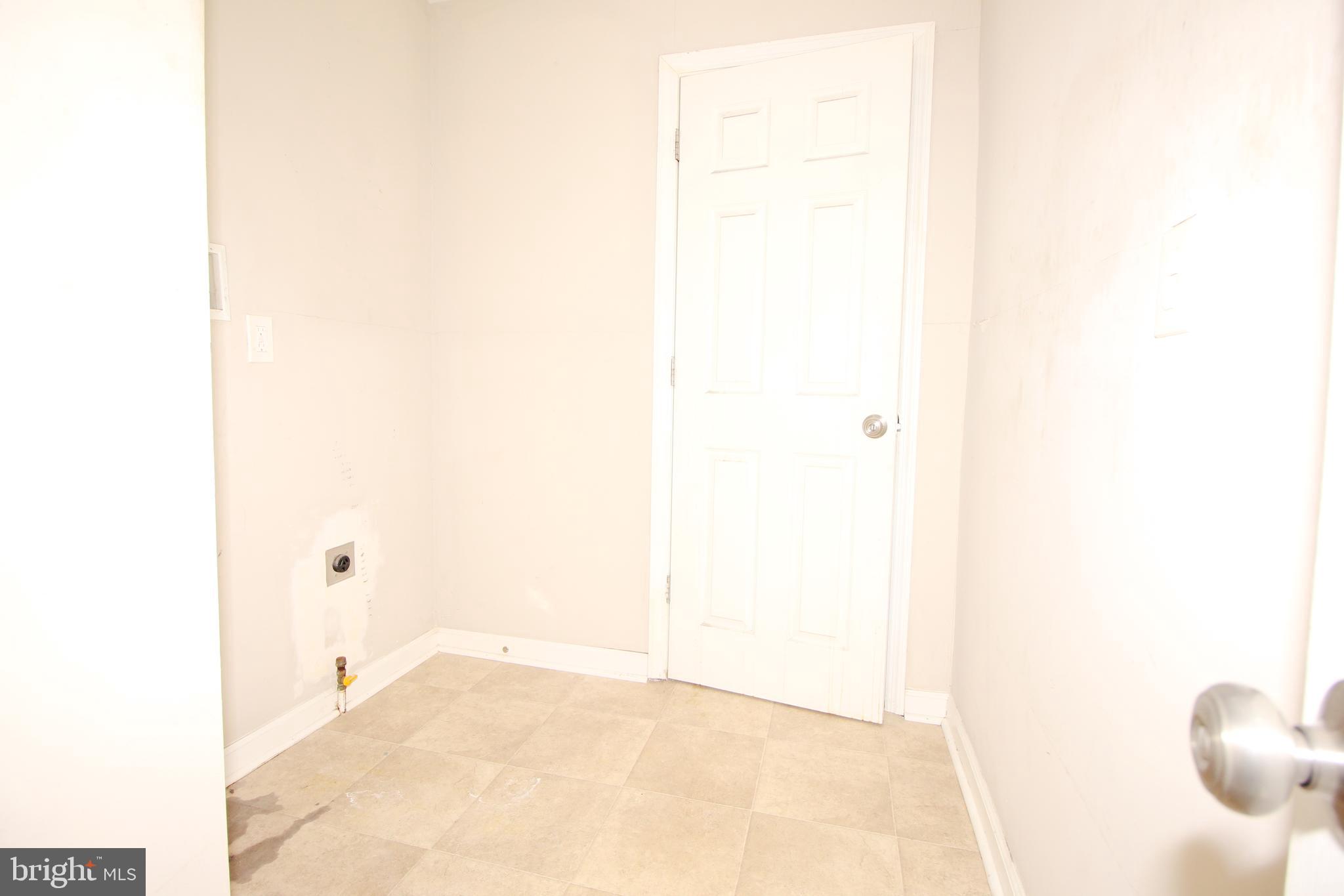 63 Ridgley Street Mount Holly, NJ 08060 - Photo 13 of 30 a view of a room with white wall and a white wall