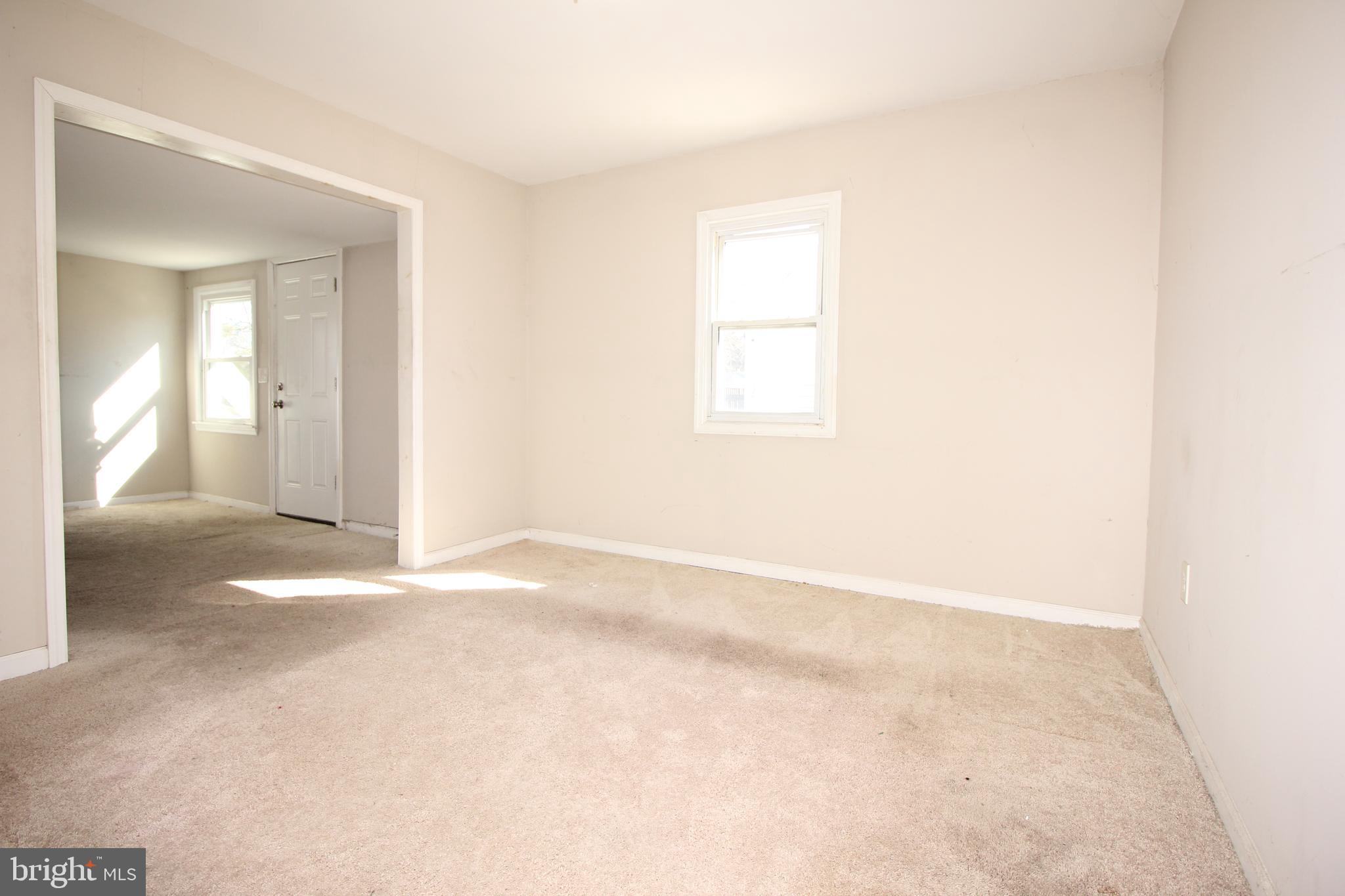 63 Ridgley Street Mount Holly, NJ 08060 - Photo 14 of 30 a view of an empty room with a window