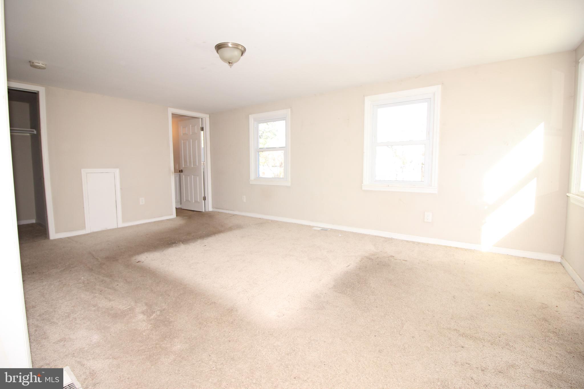63 Ridgley Street Mount Holly, NJ 08060 - Photo 15 of 30 an empty room with windows
