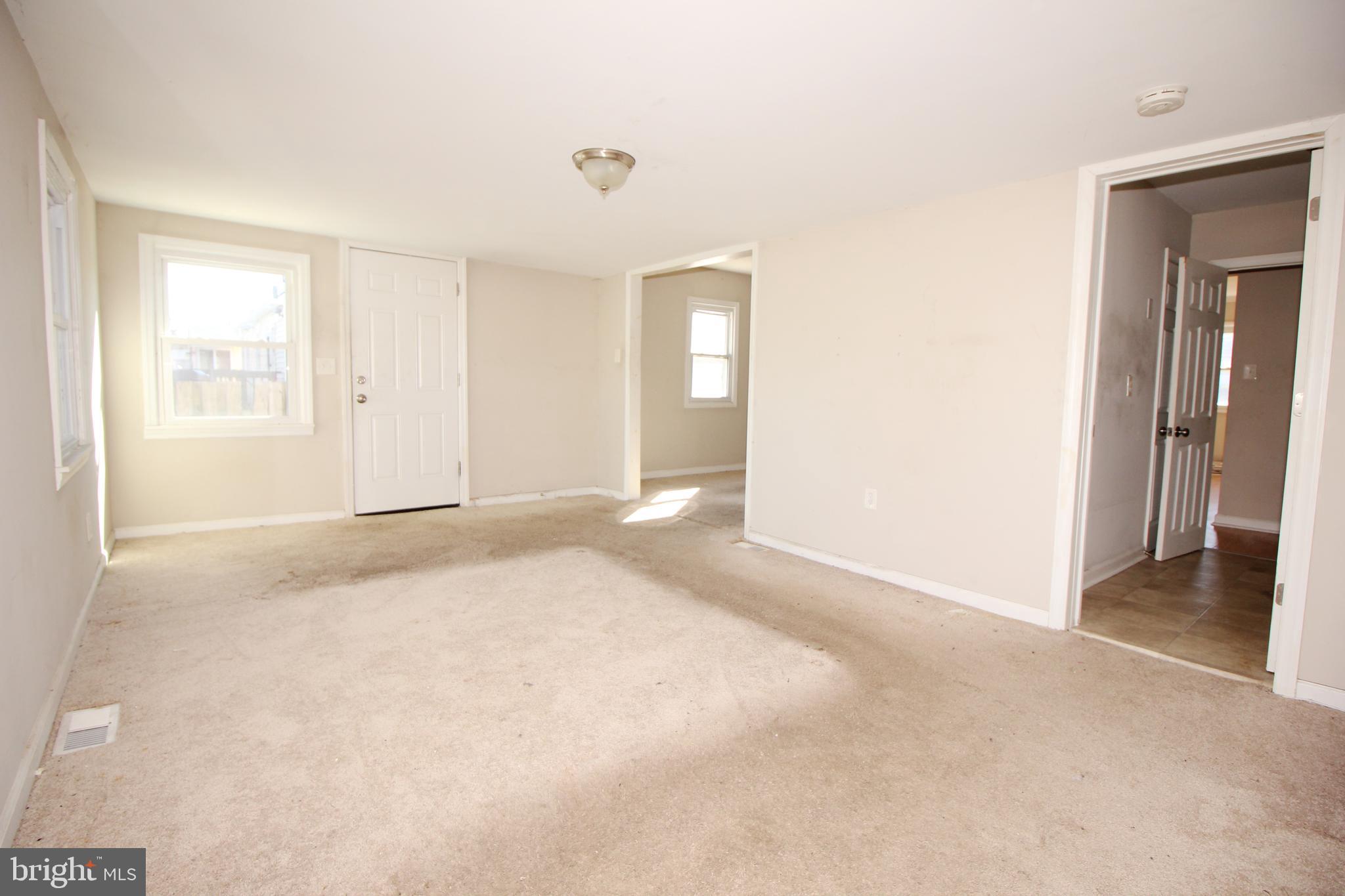 63 Ridgley Street Mount Holly, NJ 08060 - Photo 17 of 30 an empty room with windows and closet