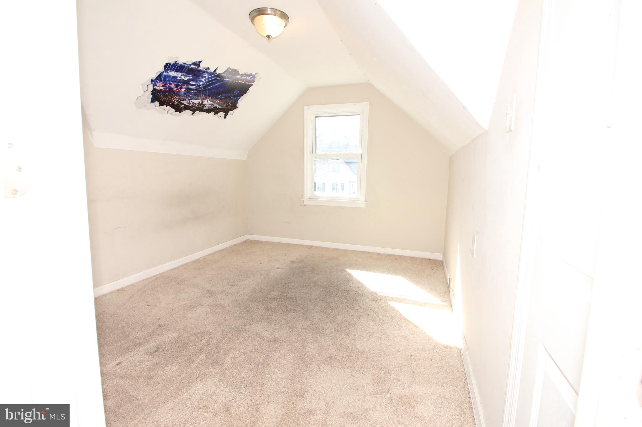 63 Ridgley Street Mount Holly, NJ 08060 - Photo 19 of 30 a view of a room with a window