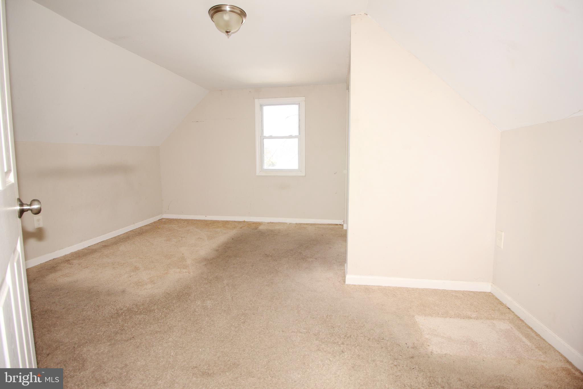 63 Ridgley Street Mount Holly, NJ 08060 - Photo 21 of 30 a view of a room that has a window in it