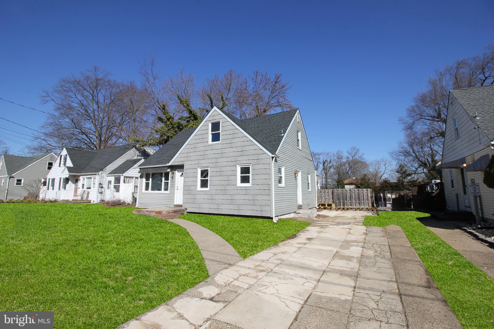 63 Ridgley Street Mount Holly, NJ 08060 - Photo 3 of 30 a front view of a house with yard