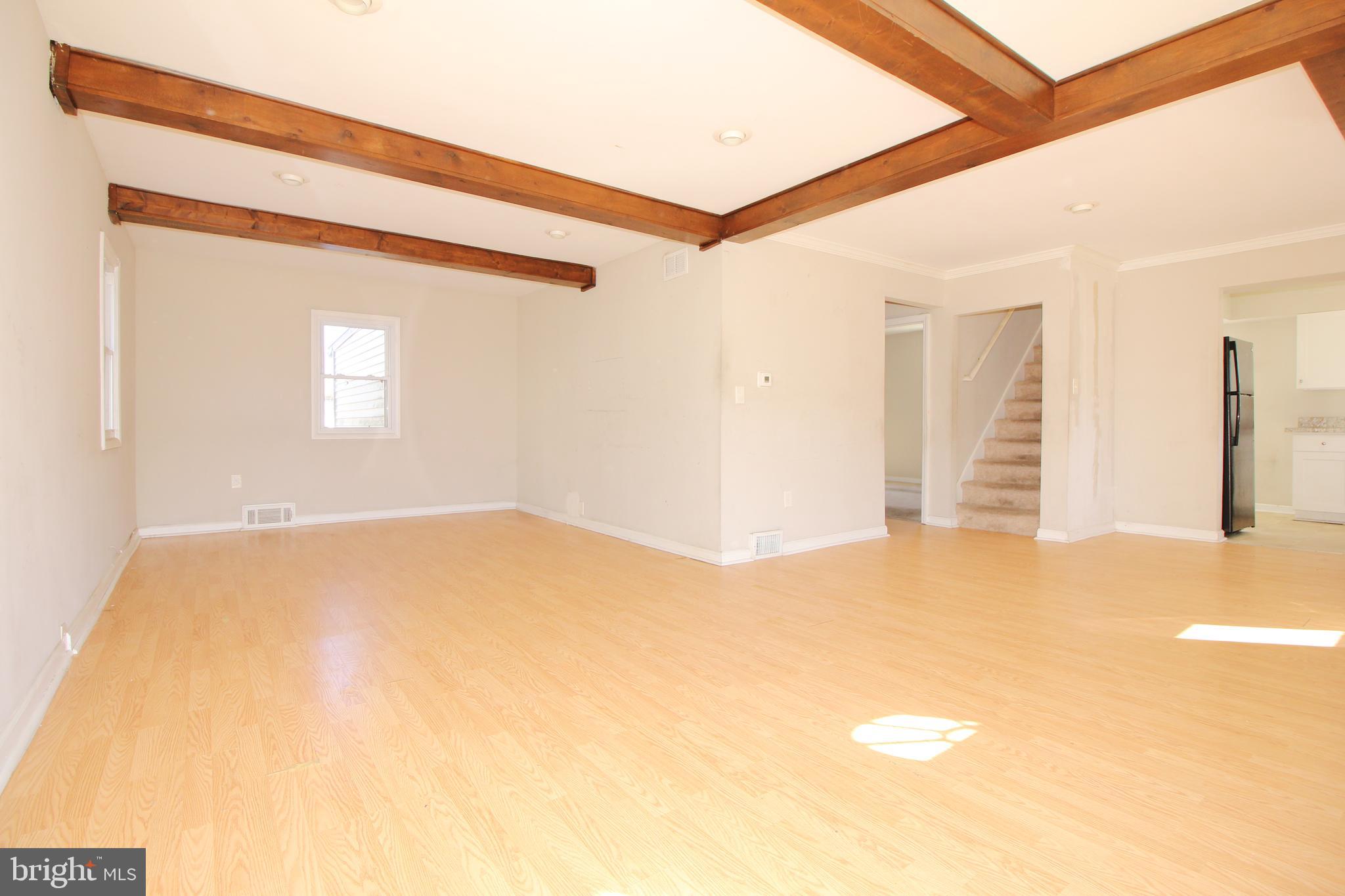 63 Ridgley Street Mount Holly, NJ 08060 - Photo 8 of 30 a view of empty room with wooden floor