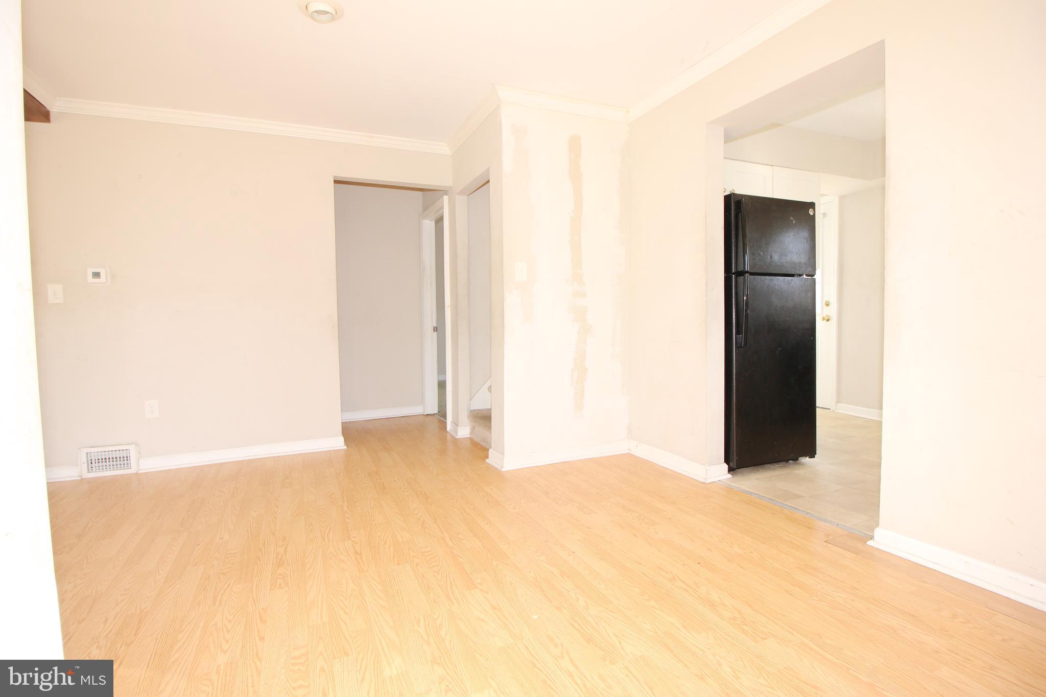 63 Ridgley Street Mount Holly, NJ 08060 - Photo 10 of 30 a view of an empty room with closet and a window