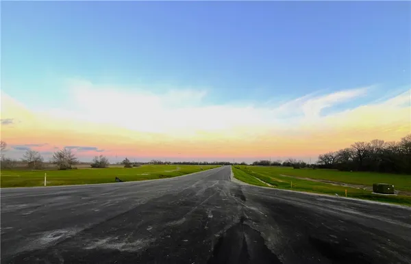 a view of swimming pool from a balcony