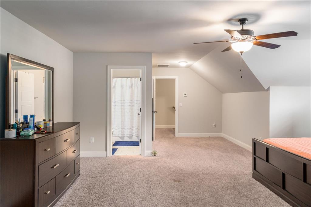 712 Fleeting Way Monroe, GA 30655 - Photo 24 of 29 a view of a room with cabinet and mirrors