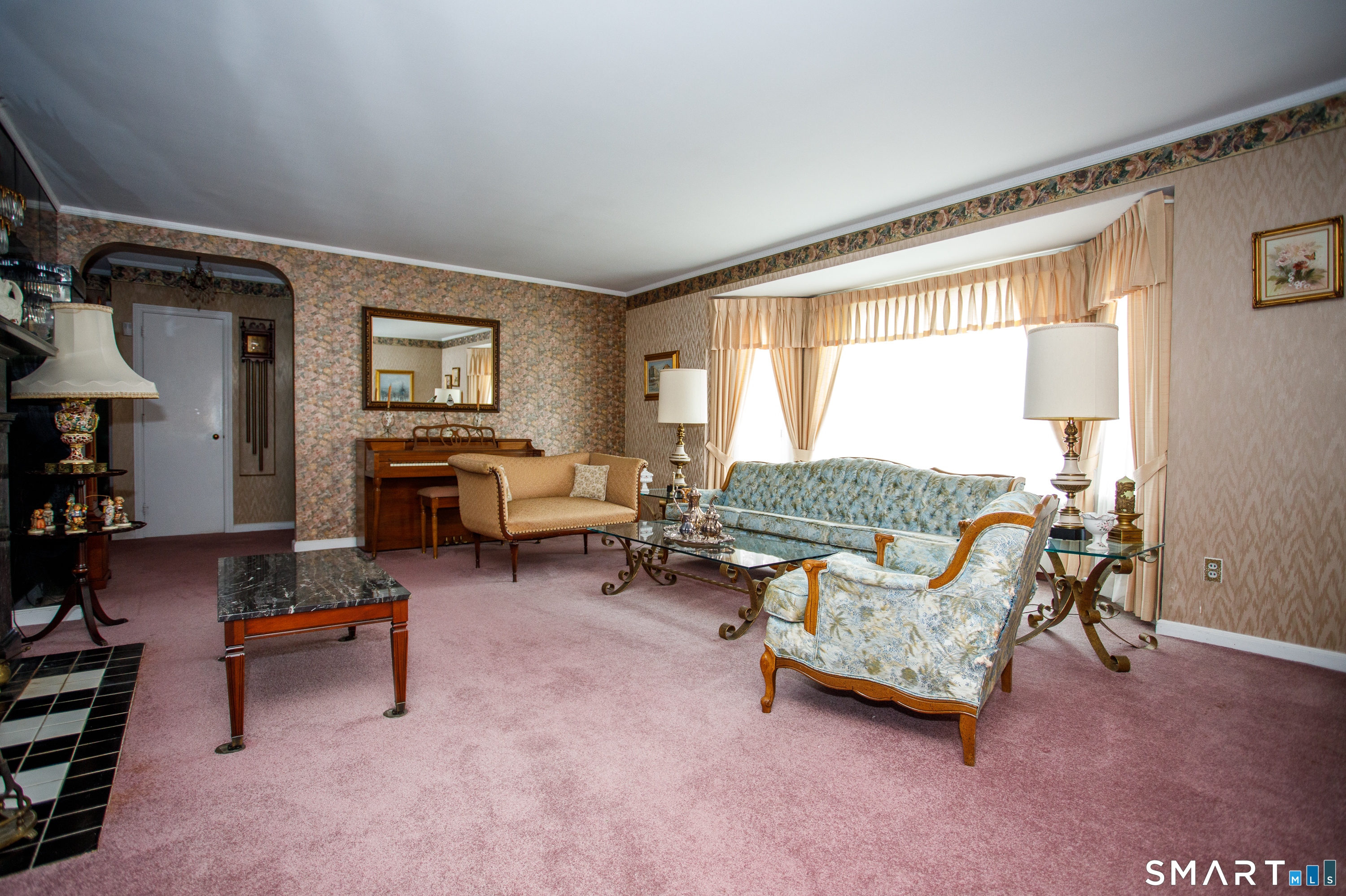 164 Harland Road Norwich, CT 06360 - Photo 2 of 29 a living room with furniture and a fireplace