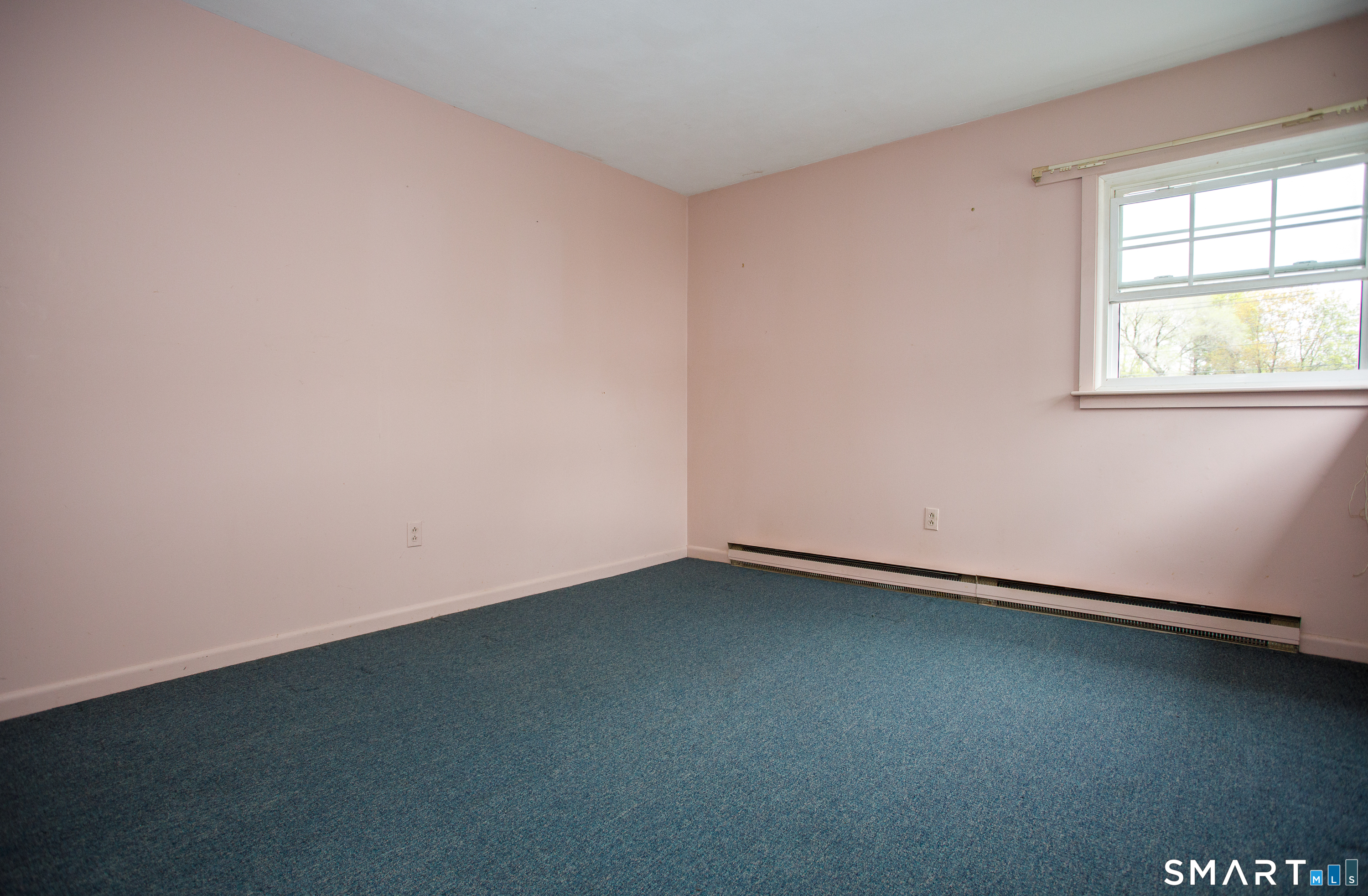 164 Harland Road Norwich, CT 06360 - Photo 24 of 29 an empty room with a window