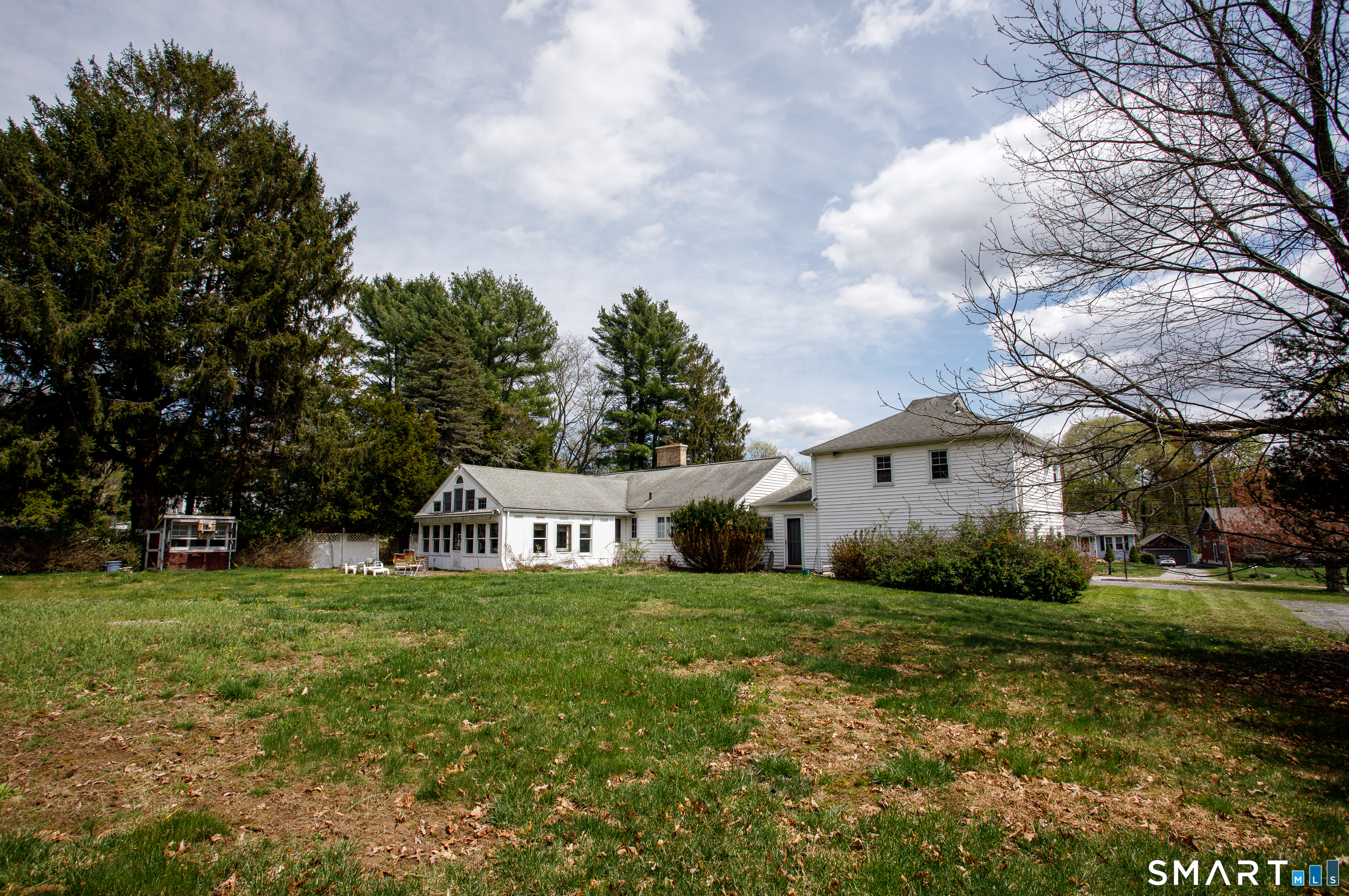 164 Harland Road Norwich, CT 06360 - Photo 27 of 29 a view of a house with yard and sitting area