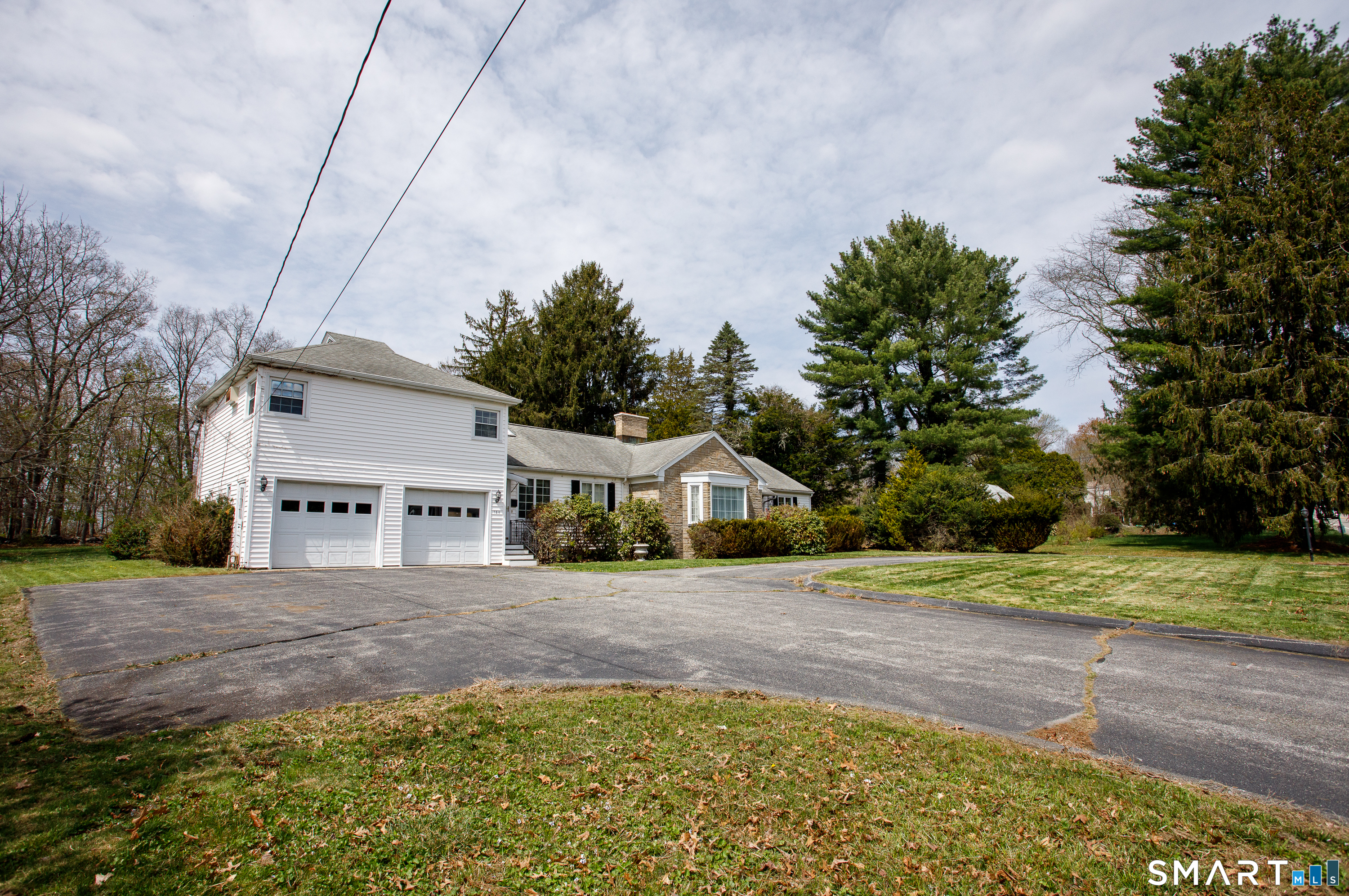 164 Harland Road Norwich, CT 06360 - Photo 28 of 29 a front view of a house with a yard