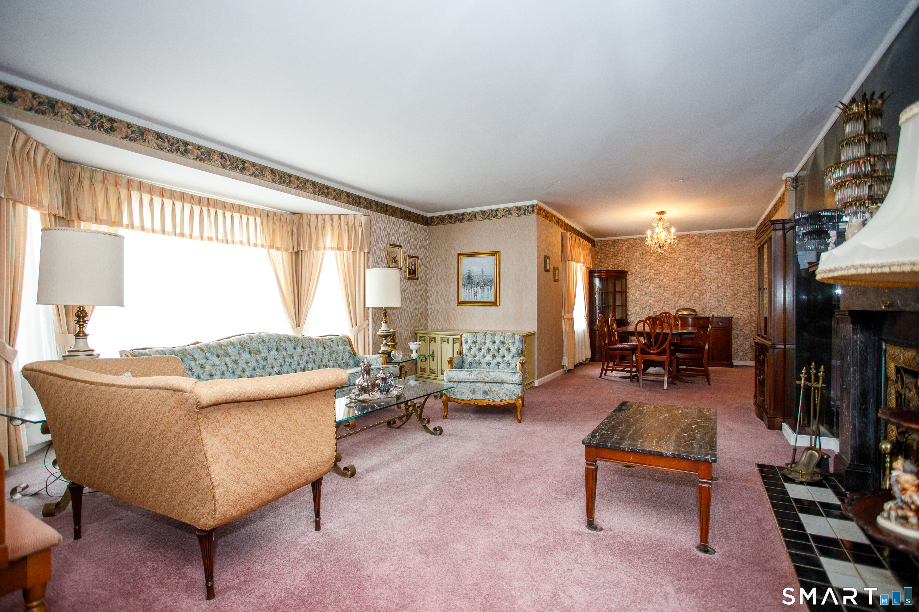 164 Harland Road Norwich, CT 06360 - Photo 4 of 29 a living room with furniture and a large window
