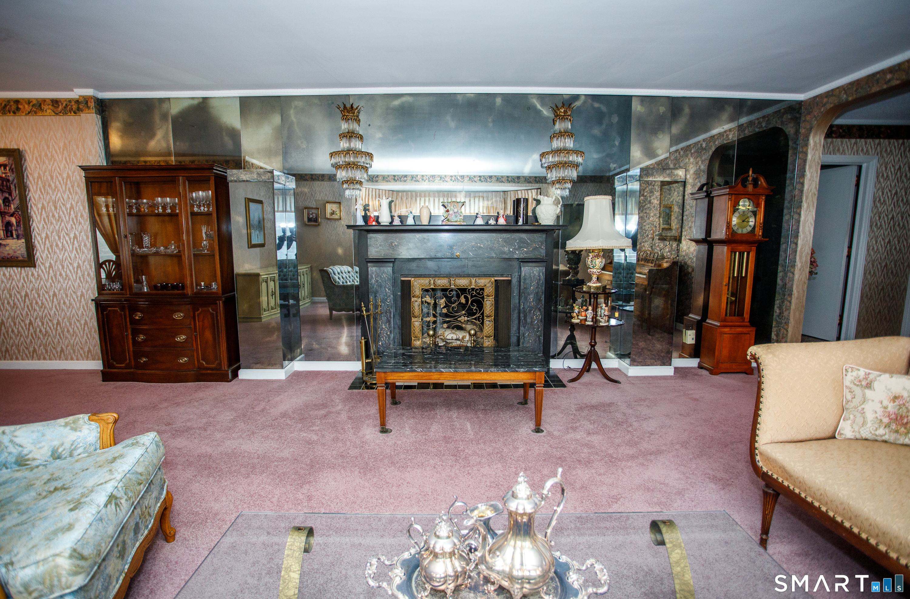 164 Harland Road Norwich, CT 06360 - Photo 6 of 29 a living room with furniture and a fireplace