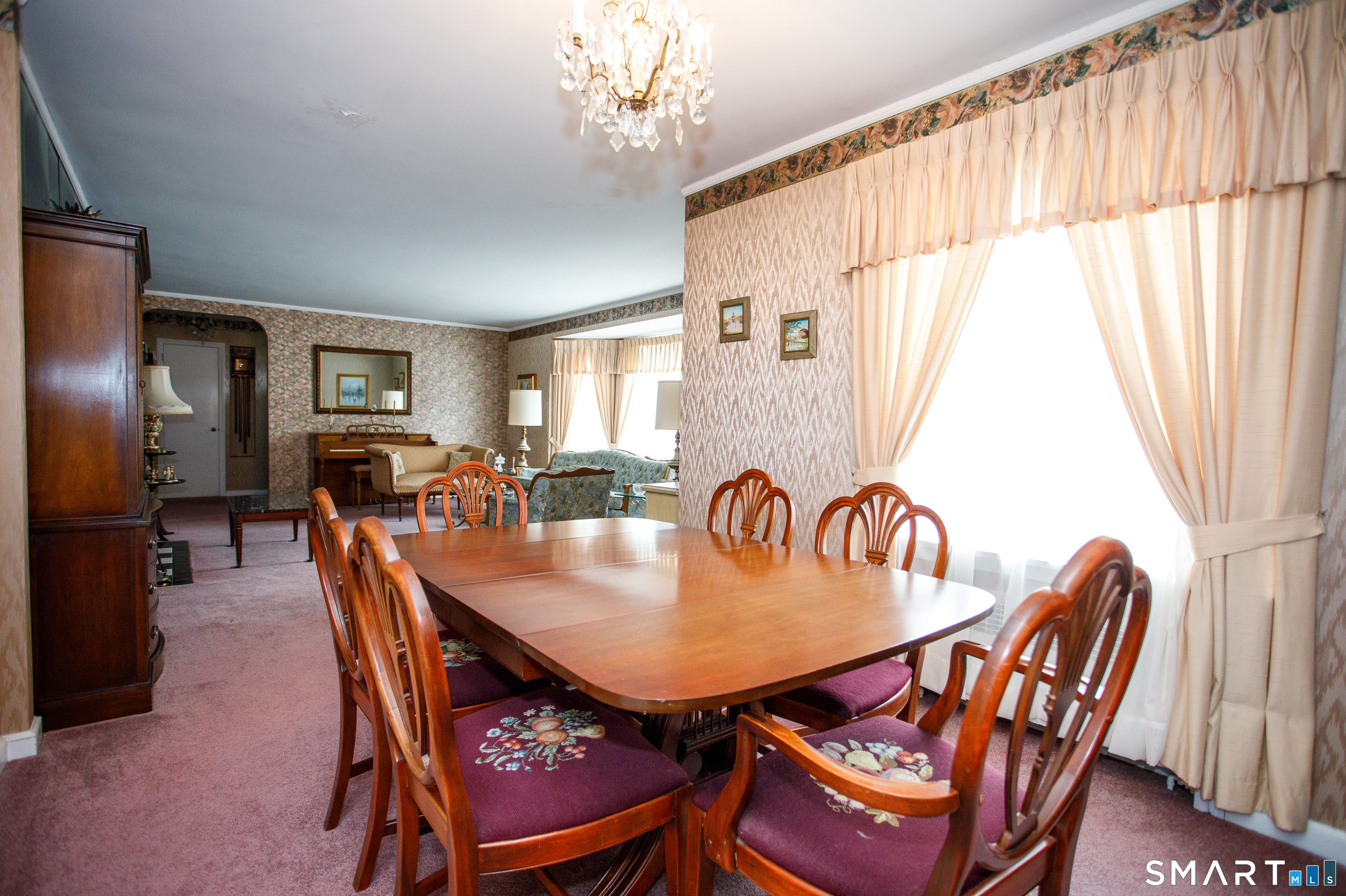 164 Harland Road Norwich, CT 06360 - Photo 8 of 29 a view of a dining room with furniture window and wooden floor
