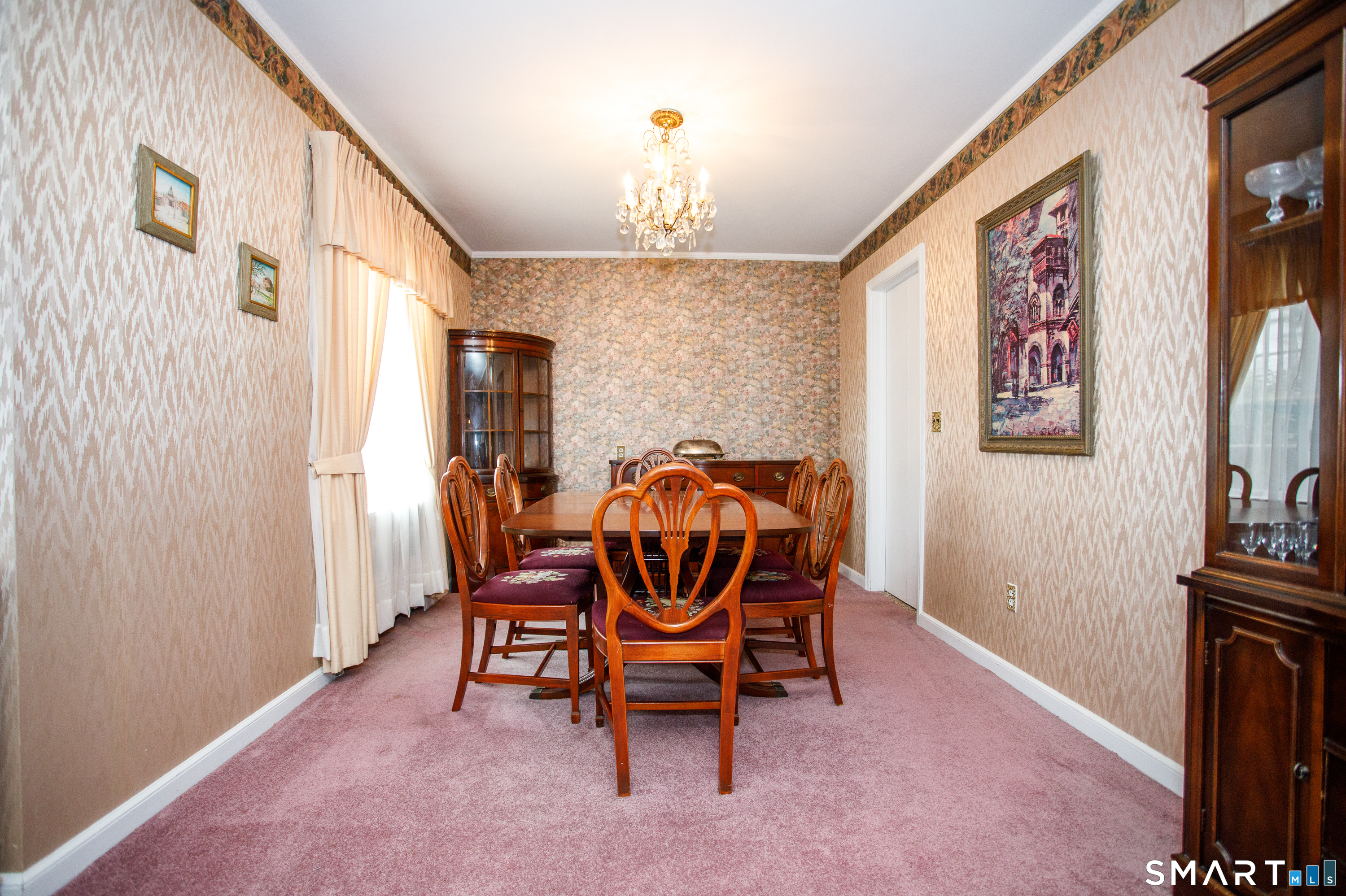 164 Harland Road Norwich, CT 06360 - Photo 9 of 29 a workspace with furniture and chandelier
