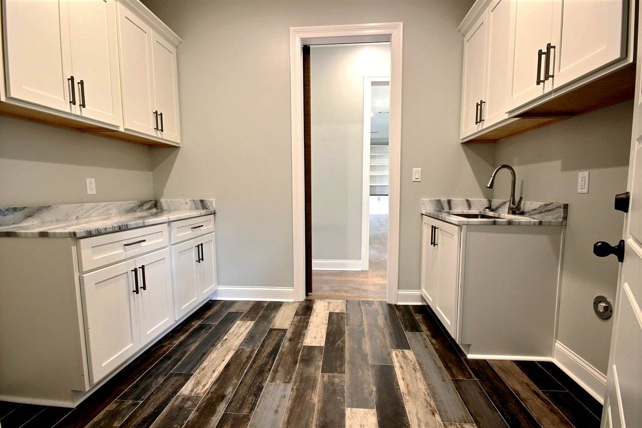 1251 Bray Station Road Collierville, TN 38017 - Photo 9 of 25 Laundry room with sink and room for seperate refrig.