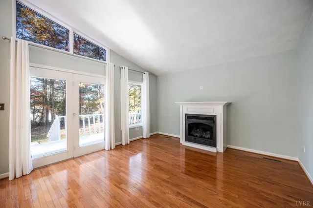 a bathroom with a sink mirror and toilet