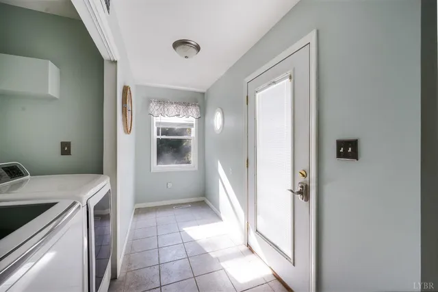 a view of backyard with large trees