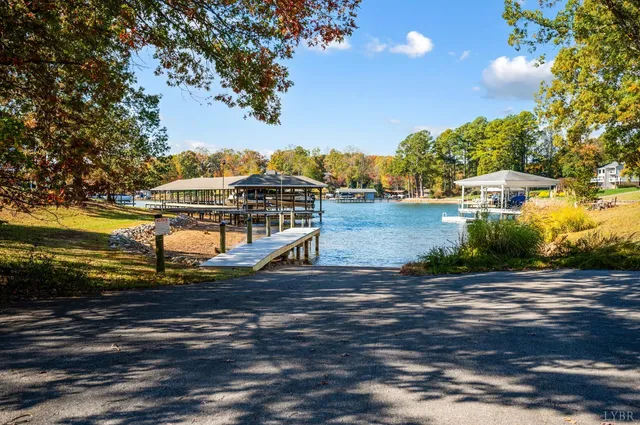 a view of a tennis court with chairs