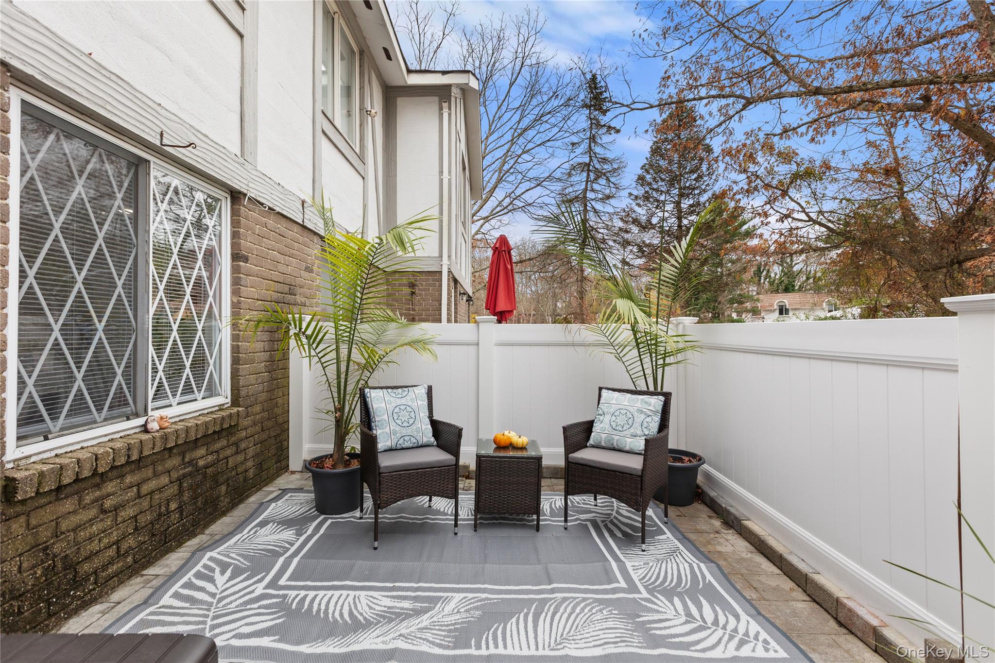 87 Birchwood Road Medford, NY 11763 - Photo 15 of 21 Fenced backyard featuring a patio area