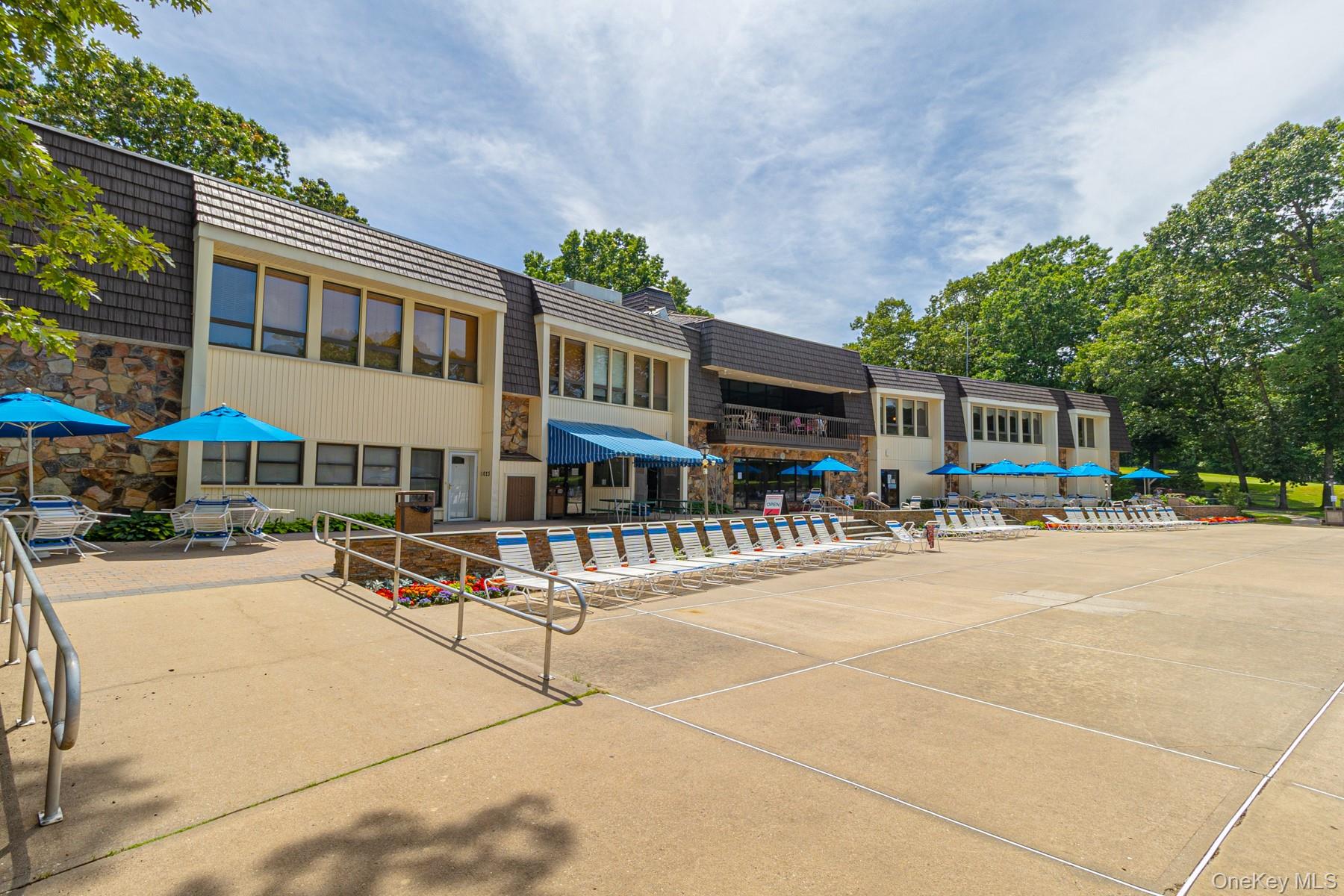 87 Birchwood Road Medford, NY 11763 - Photo 20 of 21 View of community with a pool