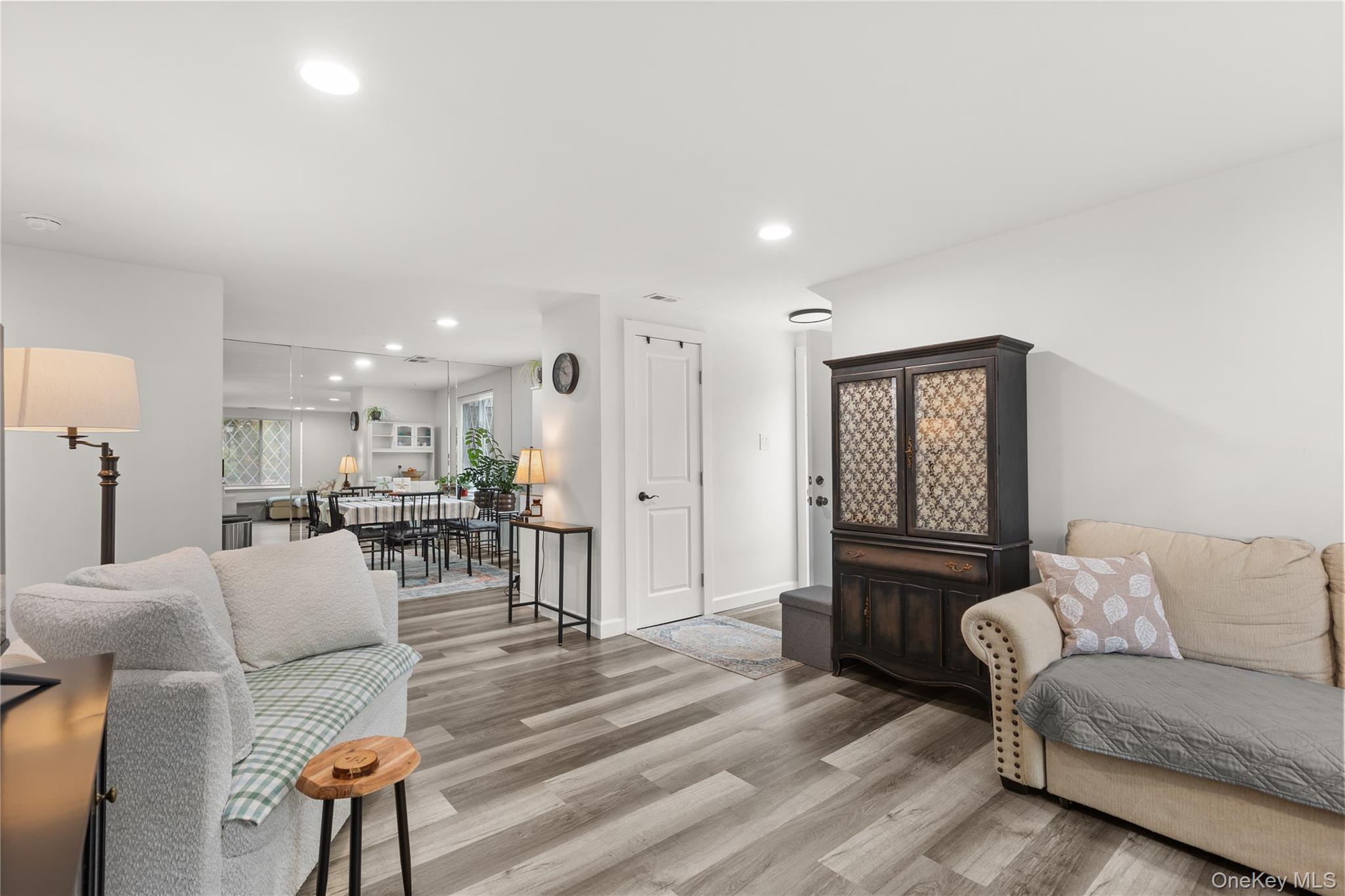 87 Birchwood Road Medford, NY 11763 - Photo 5 of 21 Living room with recessed lighting and wood finished floors