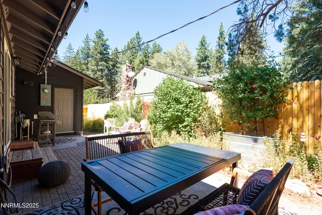 a backyard of a house with seating space