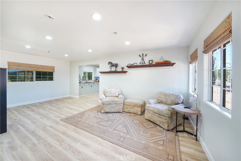 2165 Lilac Road Ramona, CA 92065 - Photo 11 of 49 a living room with furniture and a table