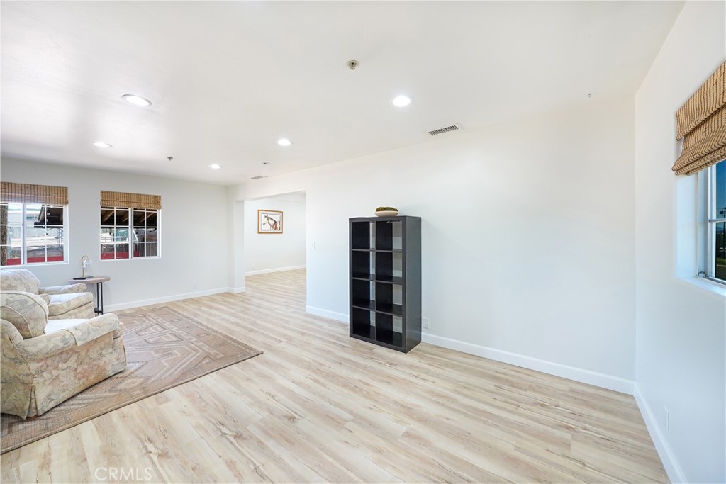 2165 Lilac Road Ramona, CA 92065 - Photo 12 of 49 a view of empty room with wooden floor
