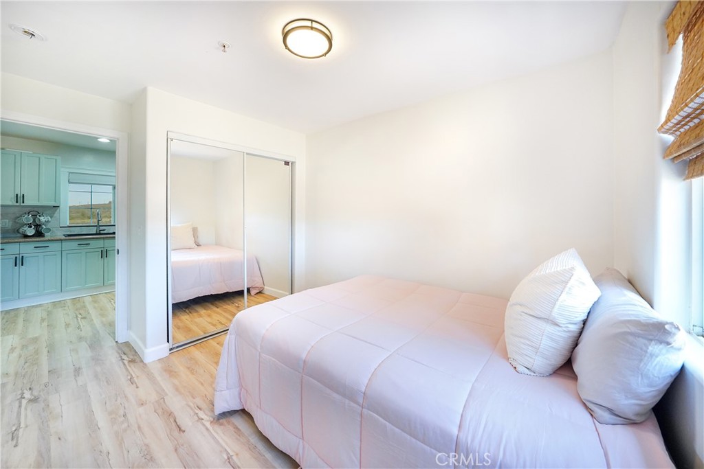 2165 Lilac Road Ramona, CA 92065 - Photo 17 of 49 a bedroom with a bed and a window