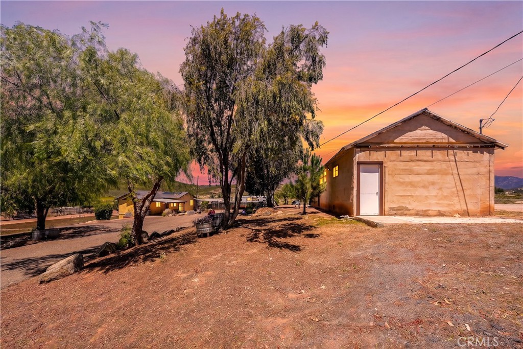 2165 Lilac Road Ramona, CA 92065 - Photo 28 of 49 a view of backyard with trees