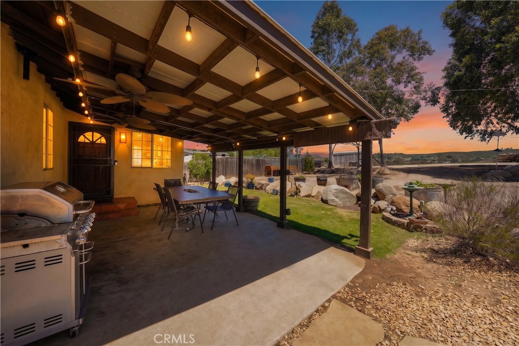 2165 Lilac Road Ramona, CA 92065 - Photo 7 of 49 a view of a porch with furniture and a backyard